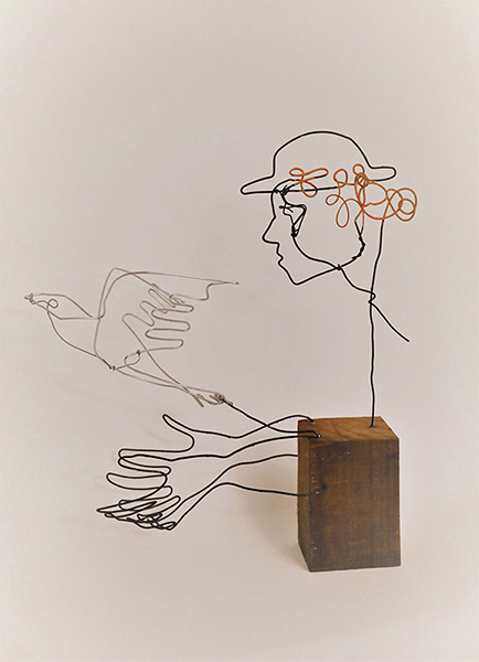 Man met vogel - ijzerdraad en acrylverf